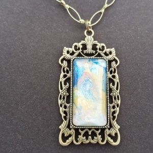 Rectangle brass tone acrylic pour paint pendant